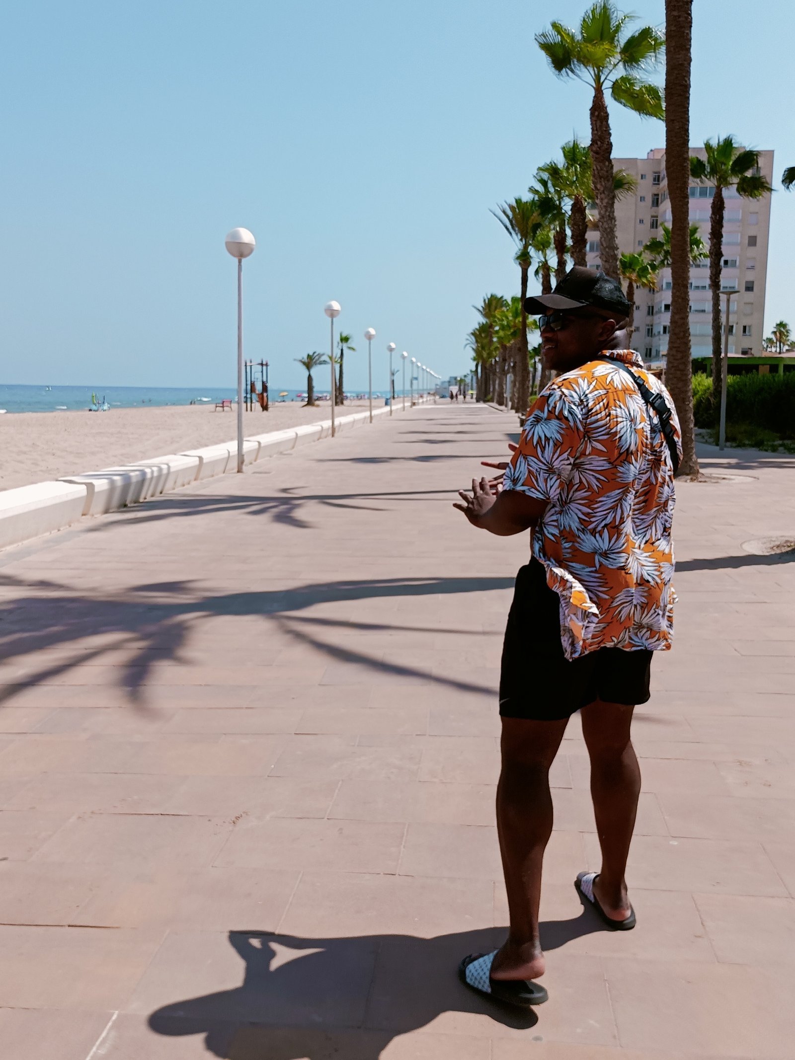 Jadon walking beside the beach in Alicante